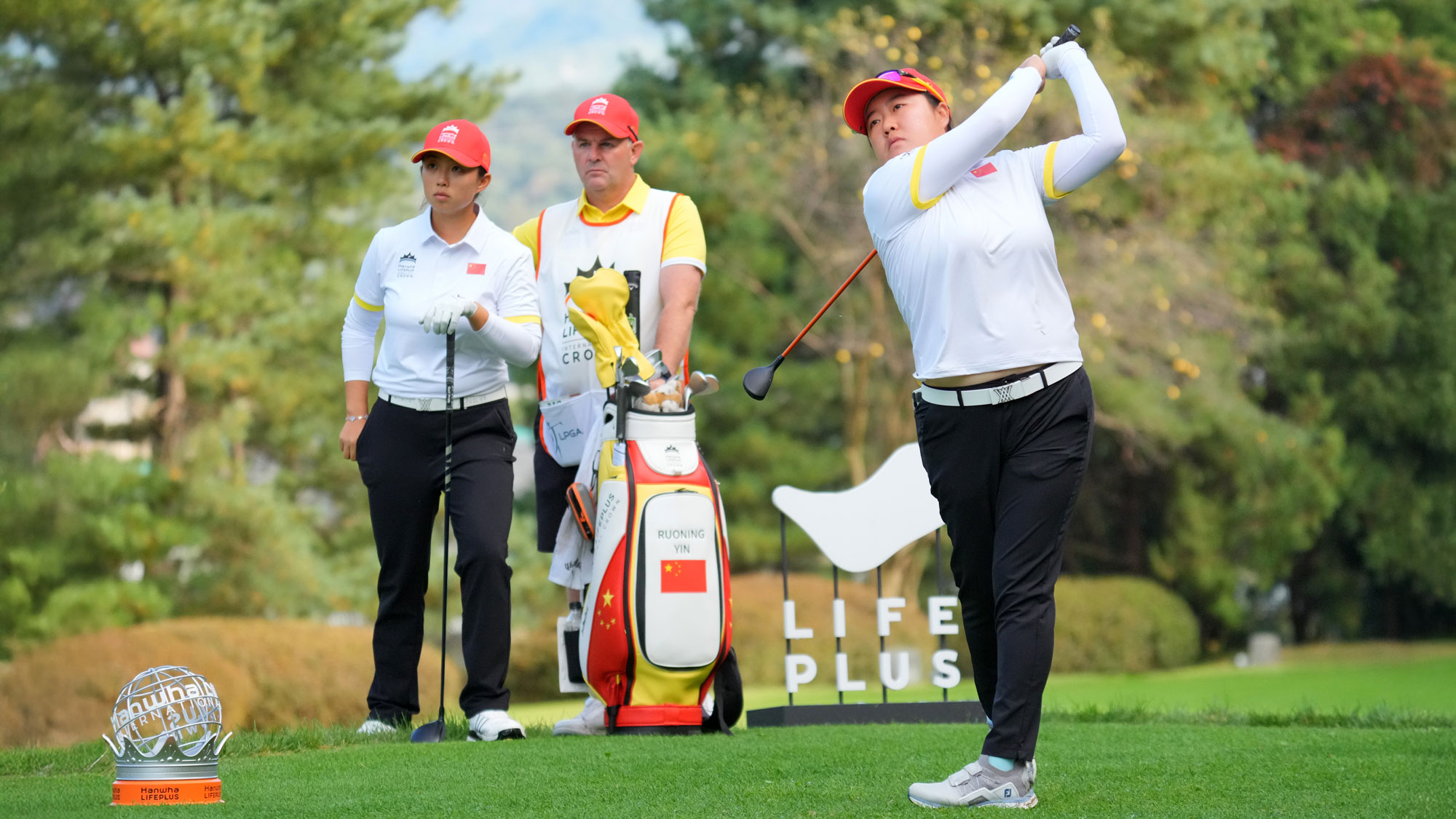 Ruixin Liu of the People's Republic of China Team hits her tee shot on the 3rd hole in the Pool A match against Australia Team during day two of the Hanwha LIFEPLUS International Crown 2025 at New Korea Country Club on October 24, 2025 in Goyang, South Korea.